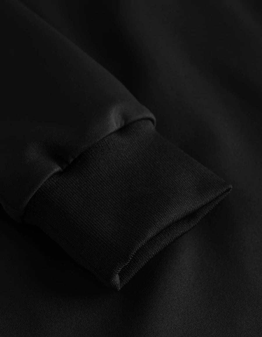 black silky track jacket